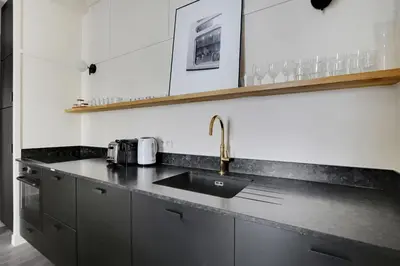Cuisine ou kitchenette dans l'établissement Pick A Flat's Apartments in Madeleine - Rue Tronchet