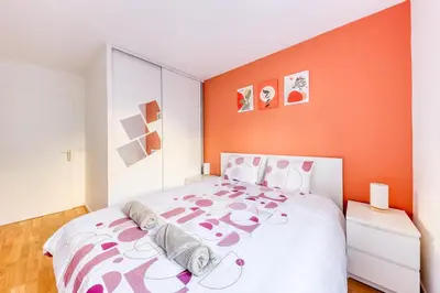 Un ou plusieurs lits dans un hébergement de l'établissement Terracotta Room - Proche Stade de France & CDG & Paris