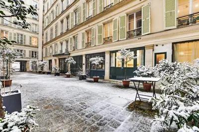 L'établissement Pick A Flat's Apartment in Opera - Rue Grange Batelière en hiver