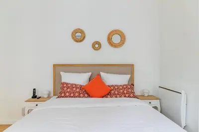 Un ou plusieurs lits dans un hébergement de l'établissement Elegant Parisian Apartment near Eiffel Tower