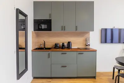 Cuisine ou kitchenette dans l'établissement Enjoy in a Lovely Nest with modern design
