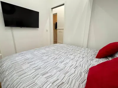 Télévision ou salle de divertissement dans l'établissement L'appartement Moliteuil
