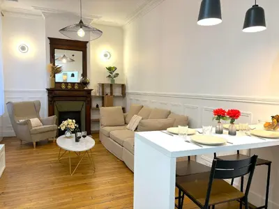 Coin salon dans l'établissement L'appartement Moliteuil