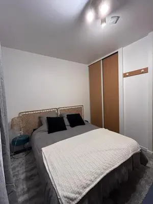 Un ou plusieurs lits dans un hébergement de l'établissement Studio in Issy Les Moulineaux
