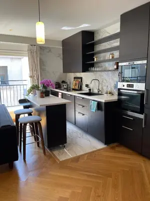 Cuisine ou kitchenette dans l'établissement Beautiful apartment terrace Invalides and fireplace