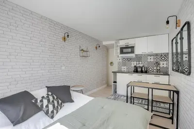 Cuisine ou kitchenette dans l'établissement Cosy Studio in center of Paris