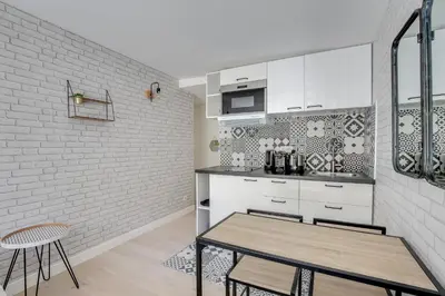 Cuisine ou kitchenette dans l'établissement Cosy Studio in center of Paris