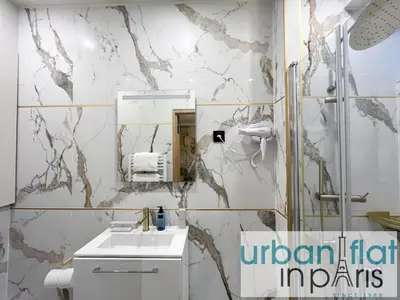 Salle de bains dans l'établissement Urban Flat - 196 Saint Honore