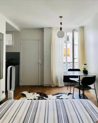 Un ou plusieurs lits dans un hébergement de l'établissement Chic Studio - Montorgueil, AC & Fast Wi-fi