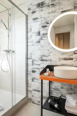 Salle de bains dans l'établissement Ibis Styles Hotel Paris Gare de Lyon Bastille