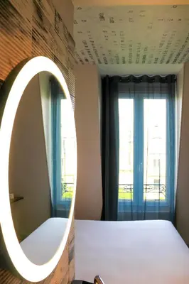 Un ou plusieurs lits dans un hébergement de l'établissement Ibis Styles Hotel Paris Gare de Lyon Bastille