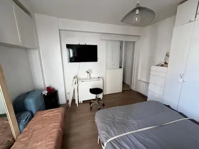 Un ou plusieurs lits dans un hébergement de l'établissement Appartement le menilmontant