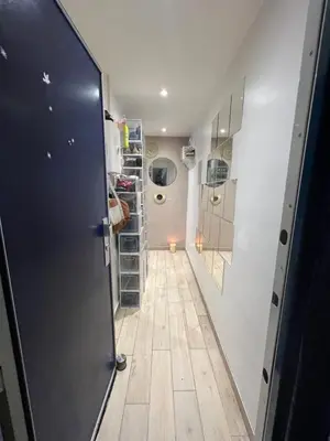 Cuisine ou kitchenette dans l'établissement Appartement le menilmontant