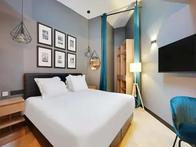 Un ou plusieurs lits dans un hébergement de l'établissement Charming studio -2P- Auteuil