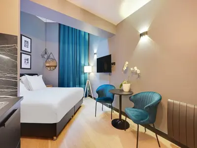 Télévision ou salle de divertissement dans l'établissement Charming studio -2P- Auteuil