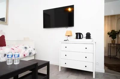 Télévision ou salle de divertissement dans l'établissement Studio Stade de France 2 pour 2 personnes