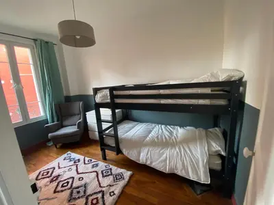 Un ou plusieurs lits dans un hébergement de l'établissement Maison Paris La Défense