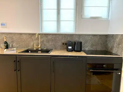 Cuisine ou kitchenette dans l'établissement Le Loft Grenelle