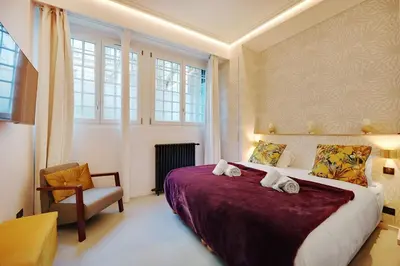 Un ou plusieurs lits dans un hébergement de l'établissement Le Marais Luxury & Trendy Apartment