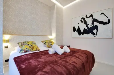 Un ou plusieurs lits dans un hébergement de l'établissement Le Marais Luxury & Trendy Apartment