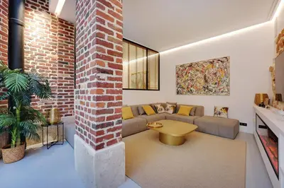 Coin salon dans l'établissement Le Marais Luxury & Trendy Apartment