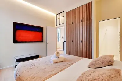 Un ou plusieurs lits dans un hébergement de l'établissement Saint Andre Des Arts HEART of PARIS Design
