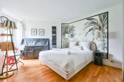 Un ou plusieurs lits dans un hébergement de l'établissement GuestReady - Charming stay near Catacombs of Paris