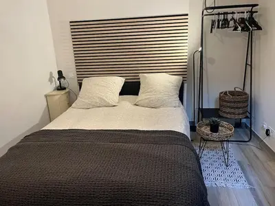 Un ou plusieurs lits dans un hébergement de l'établissement Apppartement en Duplex Montmatre Sacré Cœur