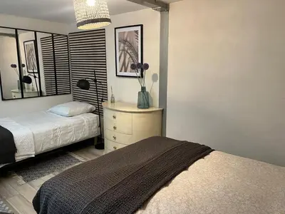 Un ou plusieurs lits dans un hébergement de l'établissement Apppartement en Duplex Montmatre Sacré Cœur