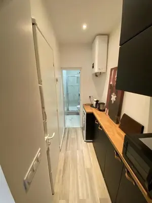 Cuisine ou kitchenette dans l'établissement Apppartement en Duplex Montmatre Sacré Cœur