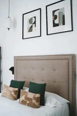 Un ou plusieurs lits dans un hébergement de l'établissement Hôtel des Beaux Arts