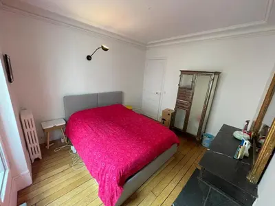 Un ou plusieurs lits dans un hébergement de l'établissement Charming and bright flat in a very convenient area