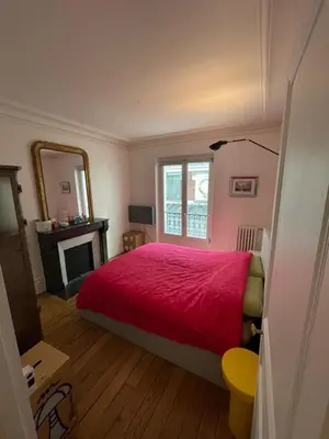 Un ou plusieurs lits dans un hébergement de l'établissement Charming and bright flat in a very convenient area