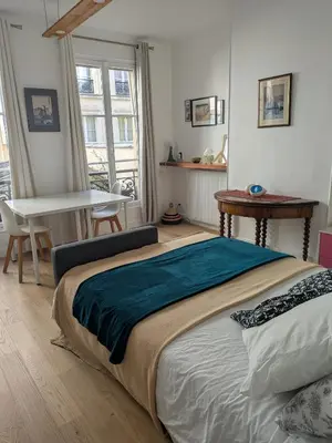Un ou plusieurs lits dans un hébergement de l'établissement Charming apartment - famous Marais neighborhood