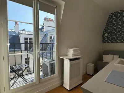 Un ou plusieurs lits dans un hébergement de l'établissement Studio Trocadéro devant le Métro Passy