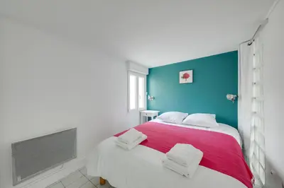 Un ou plusieurs lits dans un hébergement de l'établissement Large luxury Loft for 6 people by Weekome