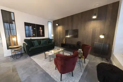 Coin salon dans l'établissement Alpohi