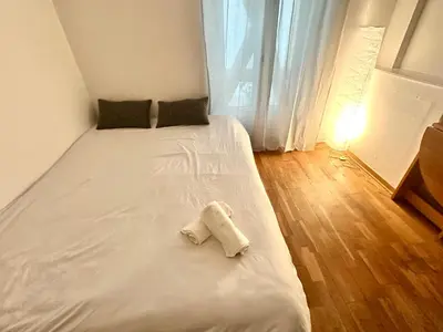 Un ou plusieurs lits dans un hébergement de l'établissement Bel appartement près de la Place de la République