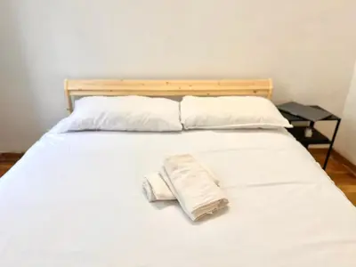 Un ou plusieurs lits dans un hébergement de l'établissement Bel appartement près de la Place de la République