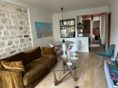 Coin salon dans l'établissement Appartement standing au cœur du 11 ème arrondissement de Paris