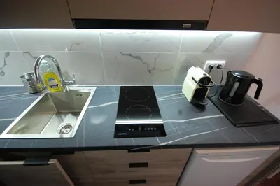 Cuisine ou kitchenette dans l'établissement Studio Paris near Invalides Unesco Eiffel Tower Montparnasse