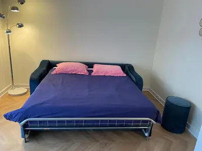 Un ou plusieurs lits dans un hébergement de l'établissement Studio Paris near Invalides Unesco Eiffel Tower Montparnasse