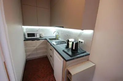 Cuisine ou kitchenette dans l'établissement Studio Paris near Invalides Unesco Eiffel Tower Montparnasse