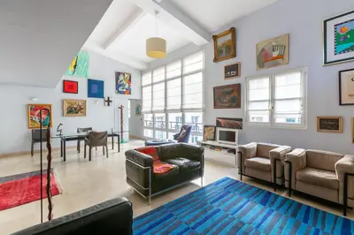 Coin salon dans l'établissement Duplex with Wifi near the Seine