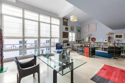 Coin salon dans l'établissement Duplex with Wifi near the Seine