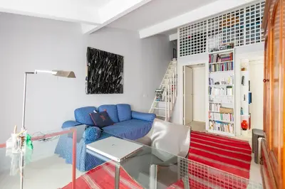 Coin salon dans l'établissement Duplex with Wifi near the Seine