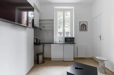 Cuisine ou kitchenette dans l'établissement Montbrun Alésia II Cosy studio 2P