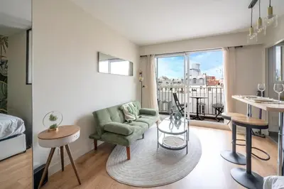 Coin salon dans l'établissement Studio with balcony - Paris 17e