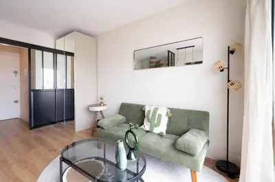 Coin salon dans l'établissement Studio with balcony - Paris 17e