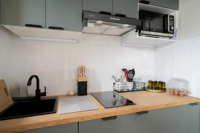 Cuisine ou kitchenette dans l'établissement Studio with balcony - Paris 17e